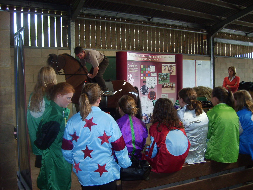 Image of: Riding a mechanical horse at Plumpton